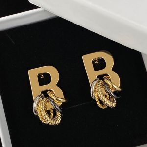 Balenciaga B Chain Logo Earrings In Gold