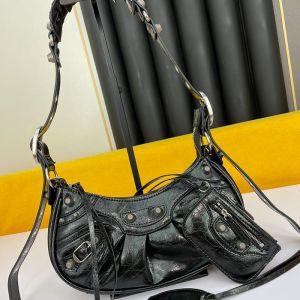 Balenciaga XS Le Cagole Shoulder Bag Embossed Leather In Black