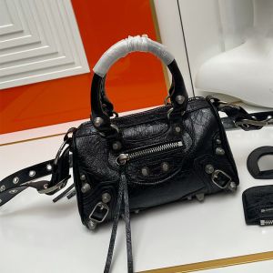 Balenciaga Mini Le Cagole Duffle Bag In Arena Lambskin Black
